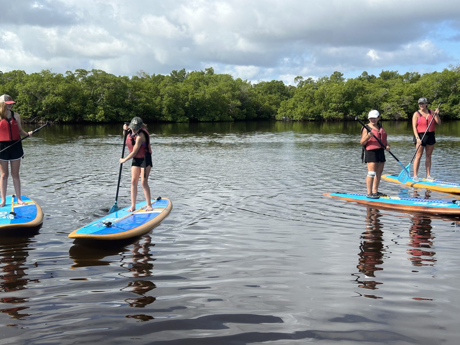 Paddleboarding with my mom, daughter and niece